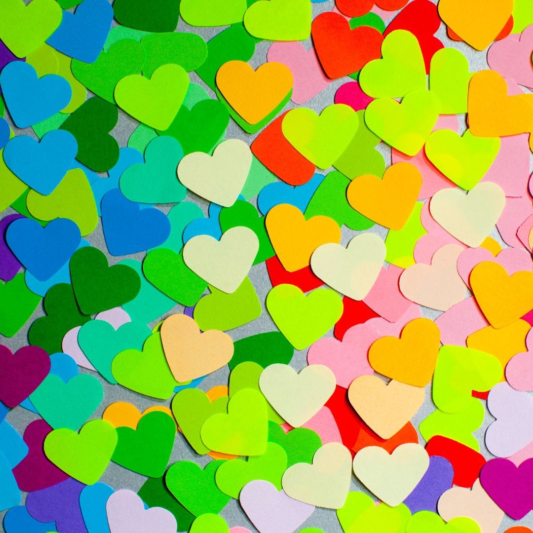 cut out paper hearts of all colors